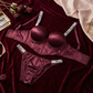 Wine red satin half-cup lingerie set with underwire and matching panty

