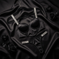 Black satin half-cup bra and panty set with luxury crystal straps
