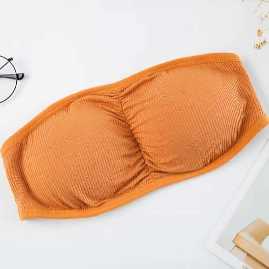 Free size Orange bandeau bra with three back straps, removable padding, and ribbed stretchable fabric.